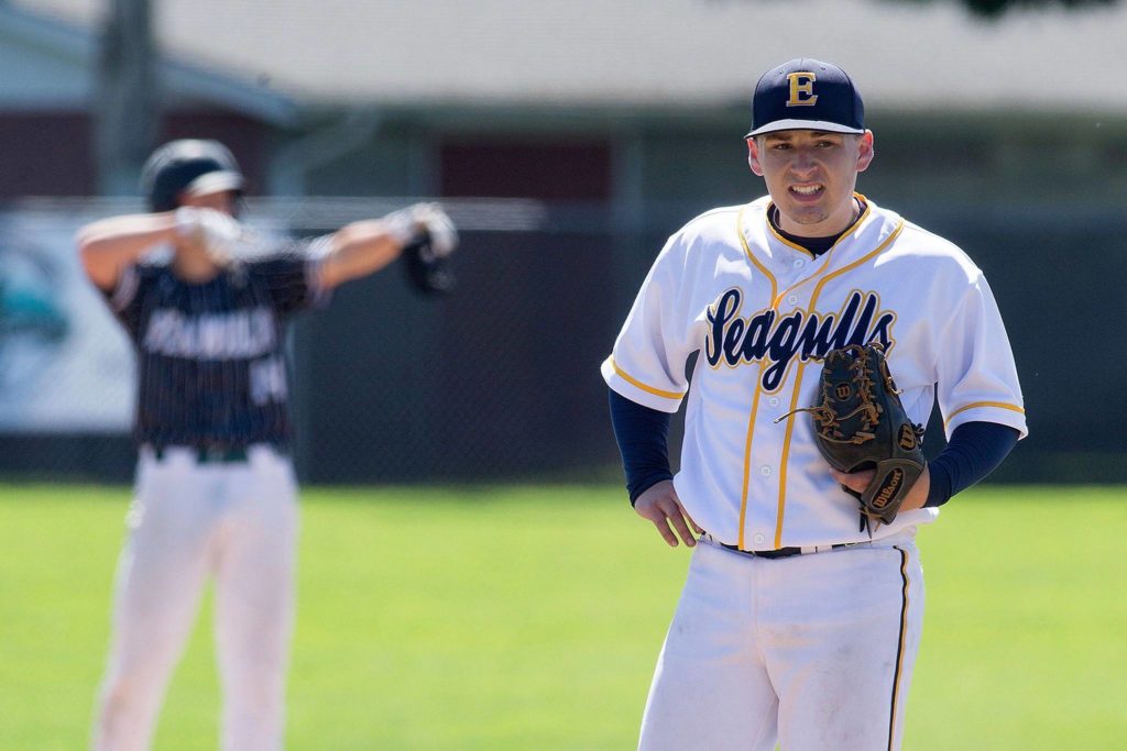 Everett pitcher Nick Mardesich takes a moment to gather himself as a Peninsula player celebrates at second base during the Seahawks’ four-run fourth inning. (Andy Bronson / The Herald)
