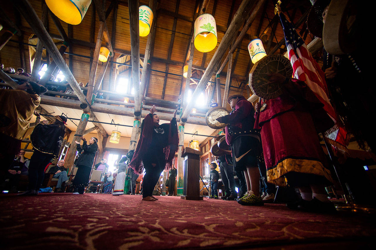 Members of the Nisqually Canoe Family perform Friday during a grand opening event for the renovated Paradise Inn at Mount Rainier National Park in Paradise. The Paradise Inn recently completed the second and final phase of a renovation project. (Joshua Bessex/The News Tribune via AP)