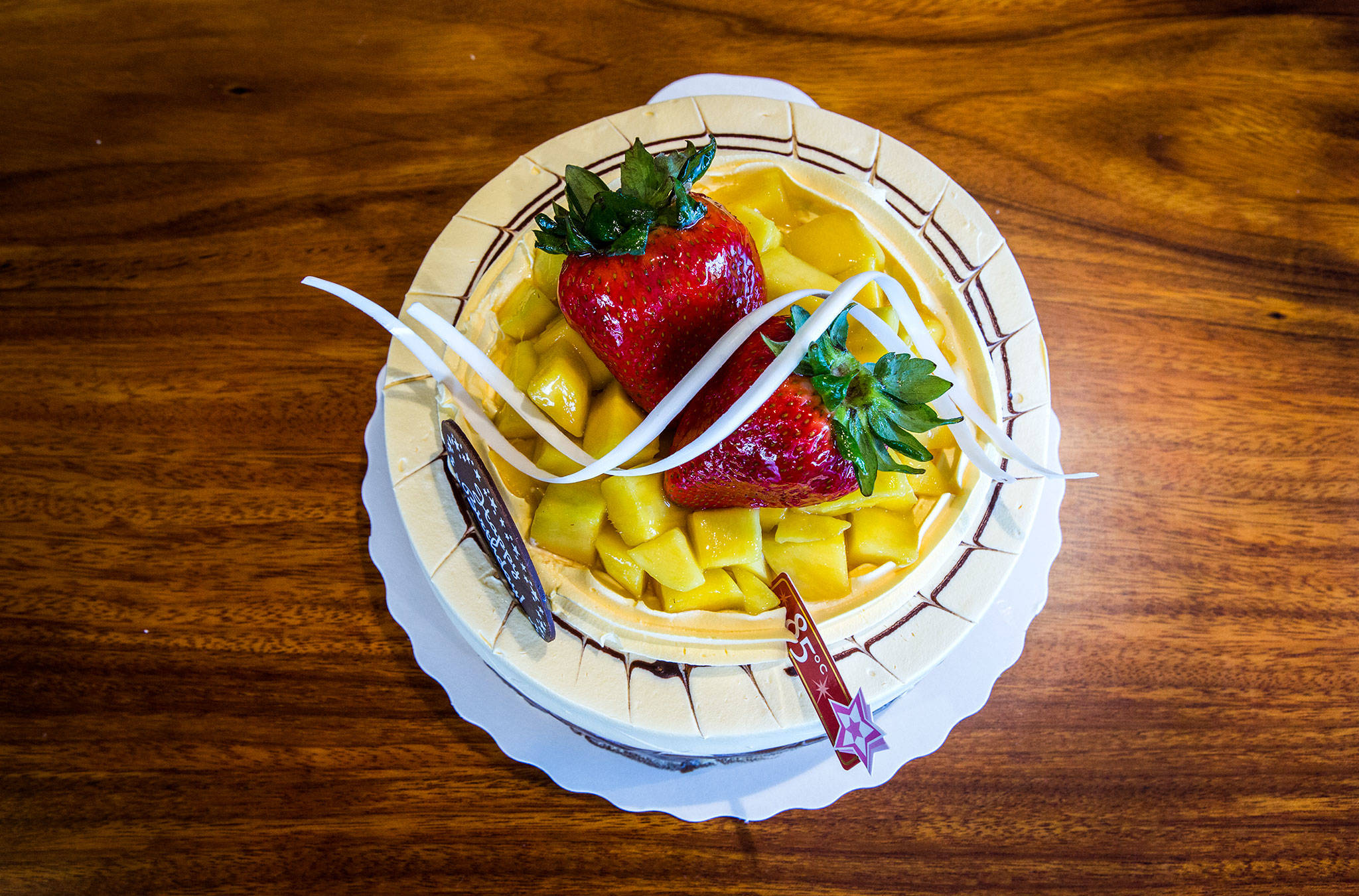 One of the best-selling items at 85°C Bakery Cafe is the mango creme brulee cake. (Olivia Vanni / The Herald)