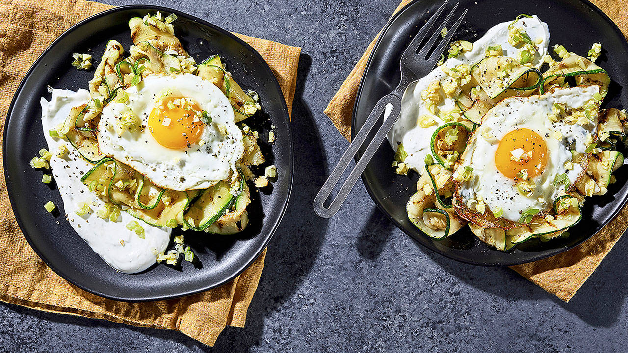 Ginger-marinated zucchini with lime yogurt is one of those put-an-egg-on-it meals. (Photo by Stacy Zarin Goldberg for The Washington Post; food styling by Lisa Cherkasky for The Washington Post)