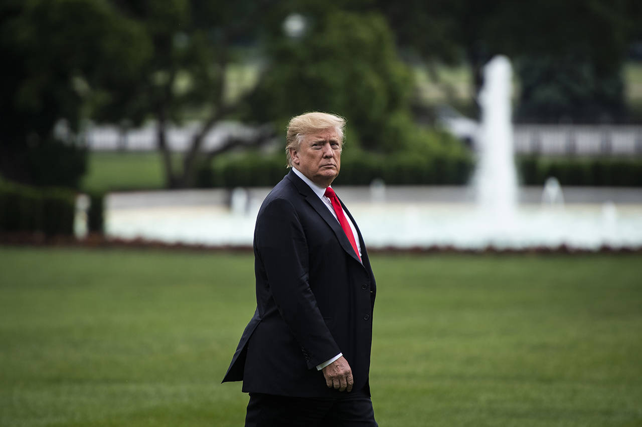 President Trump walks on the South Lawn of the White House from Marine One to the Oval Office on May 17. (Jabin Botsford/Washington Post)