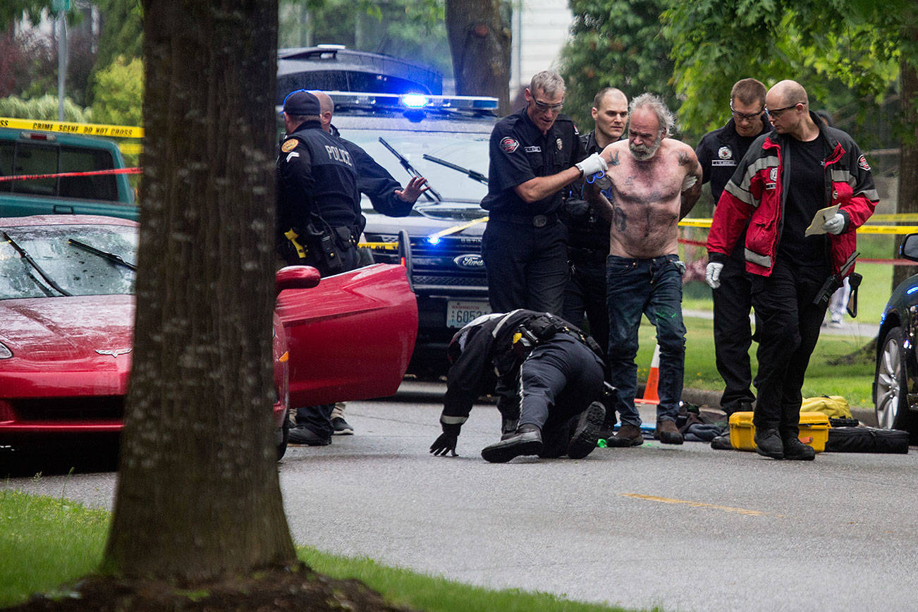 Woman shot to death at Everett workplace; exhusband arrested