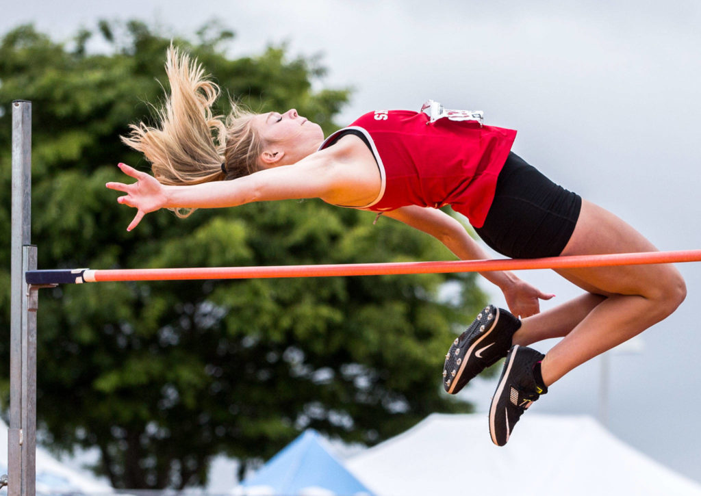 Snohomish’s Bree Nichols attempts to clear the high-jump bar during the second day of competition at the 4A/3A/2A State Track Field Championships on Friday at Mount Tahoma High School in Tacoma. (Olivia Vanni / The Herald)
