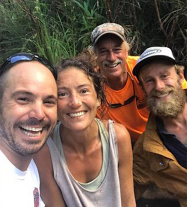 Hiker Amanda Eller (second from left) was found Friday by rescuers after being missing for 16 days in the Maui mountains. Rescuers included Javier Cantellops (left) Troy Helmers and Chris Berquist. (Javier Cantellops/Facebook)