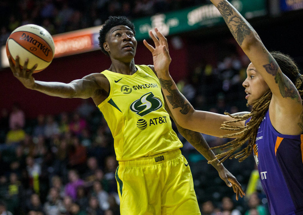 Seattle Storm’s Natasha Howard attempts a layup during the season opener game against the Phoenix Mercury on Saturday, May 25, 2019 in Everett, Wash. (Olivia Vanni / The Herald)
