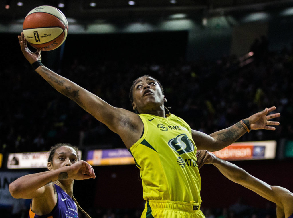 Seattle Storm’s Shavonte Zellous reaches out for a rebound during the season opener game against the Phoenix Mercury on Saturday, May 25, 2019 in Everett, Wash. (Olivia Vanni / The Herald)
