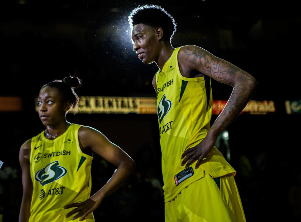Seattle Storm’s Natasha Howard, right, and Jewell Loyd are interviews after the season opener game against the Phoenix Mercury on Saturday, May 25, 2019 in Everett, Wash. (Olivia Vanni / The Herald)
