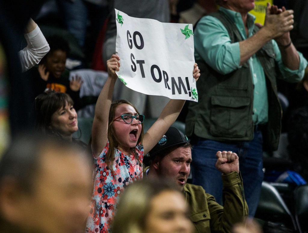 A Seattle Storm fan screams after a shot is made during the season opener game against the Phoenix Mercury on Saturday, May 25, 2019 in Everett, Wash. (Olivia Vanni / The Herald)
