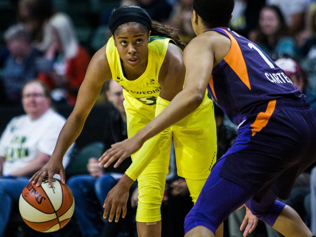 Seattle Storm’s Jordin Canada looks for an open teammate during the season opener game against the Phoenix Mercury on Saturday, May 25, 2019 in Everett, Wash. (Olivia Vanni / The Herald)
