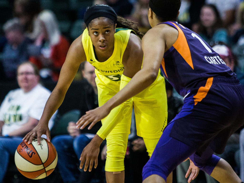 Seattle Storm’s Jordin Canada looks for an open teammate during the season opener game against the Phoenix Mercury on Saturday, May 25, 2019 in Everett, Wash. (Olivia Vanni / The Herald)