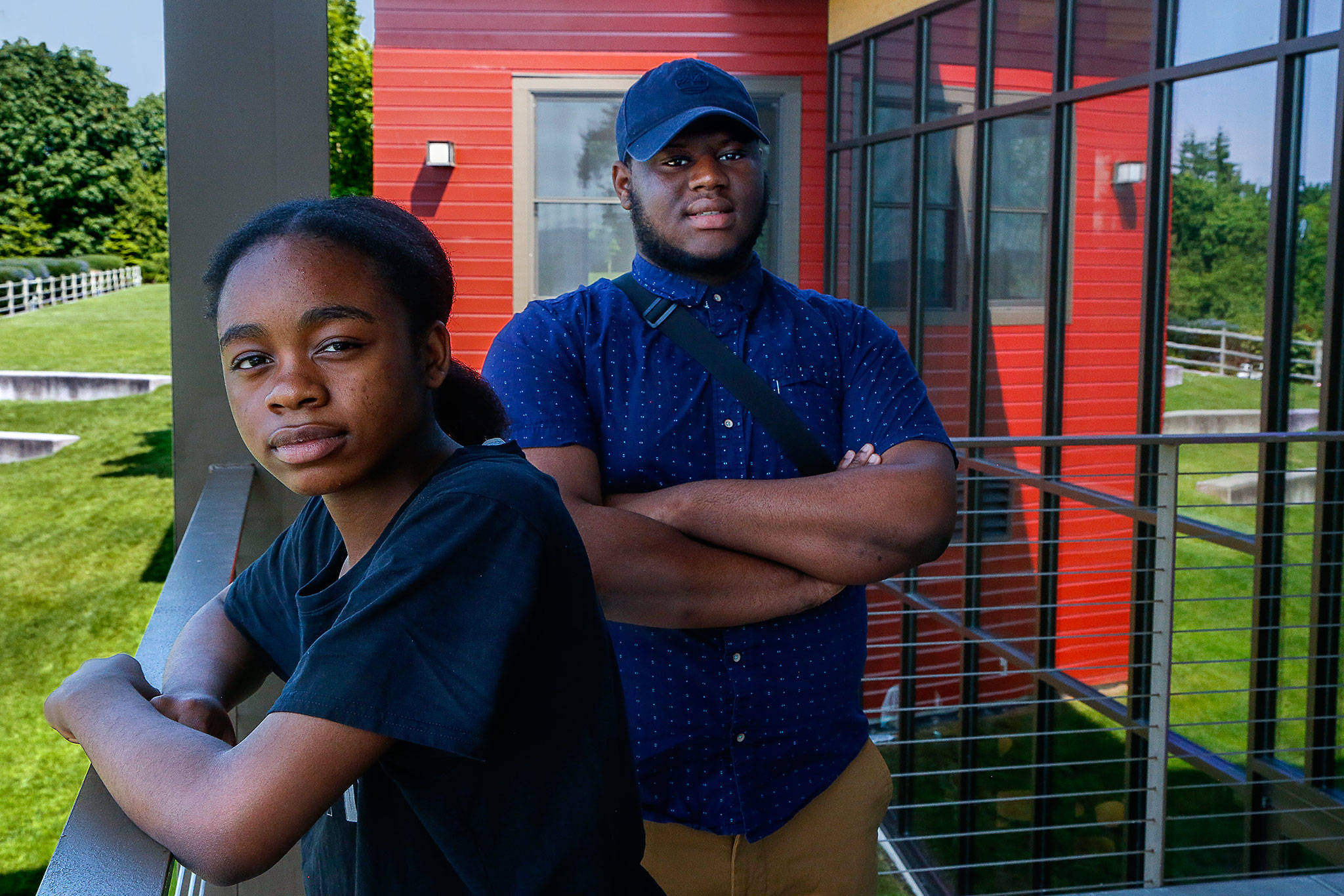 Glenda Wabaluku, 14 (left), and Abdulkarim Sankareh, 18, pay a visit to Rosehill Community Center in Mukilteo on Wednesday. They will join 16 other local teens involved in a grassroots mentoring program to put on a program Sunday at the center called “We Are Culture.” (Dan Bates / The Herald)