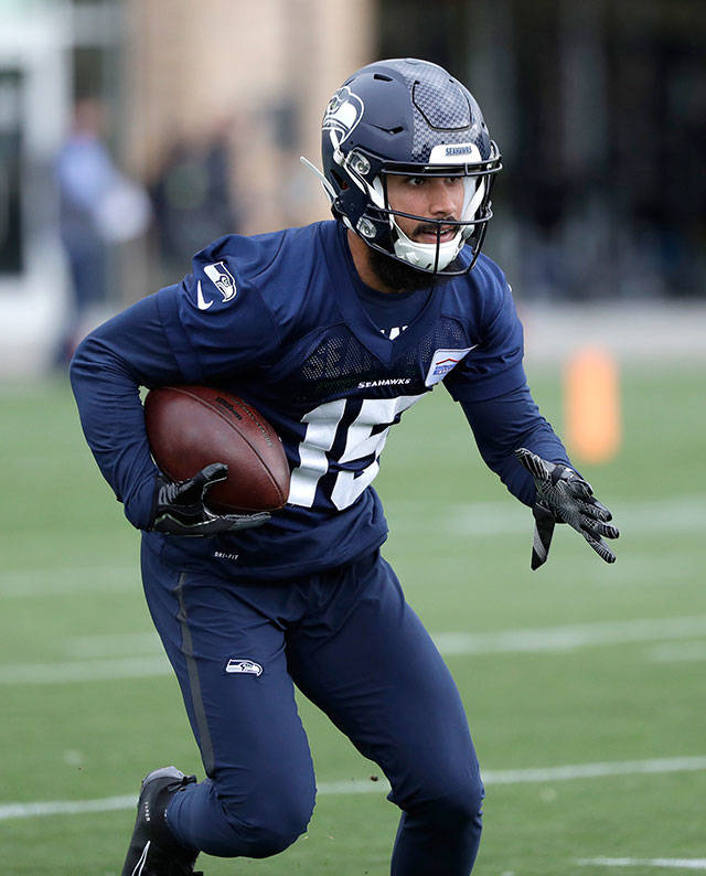 Seahawks wide receiver John Ursua runs on the field during a practice on May 21, 2019, in Renton. (AP Photo/Elaine Thompson)