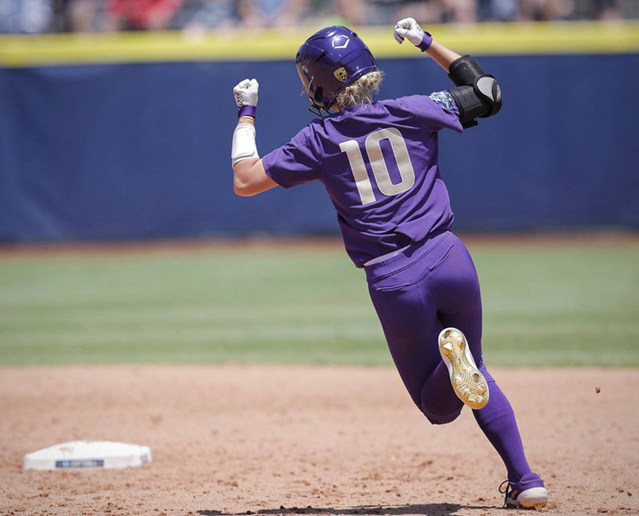 University of Washington’s Sami Reynolds rounds the bases in the opening game of the Women’s College World Series against Arizona on Thursday. (University of Washington)
