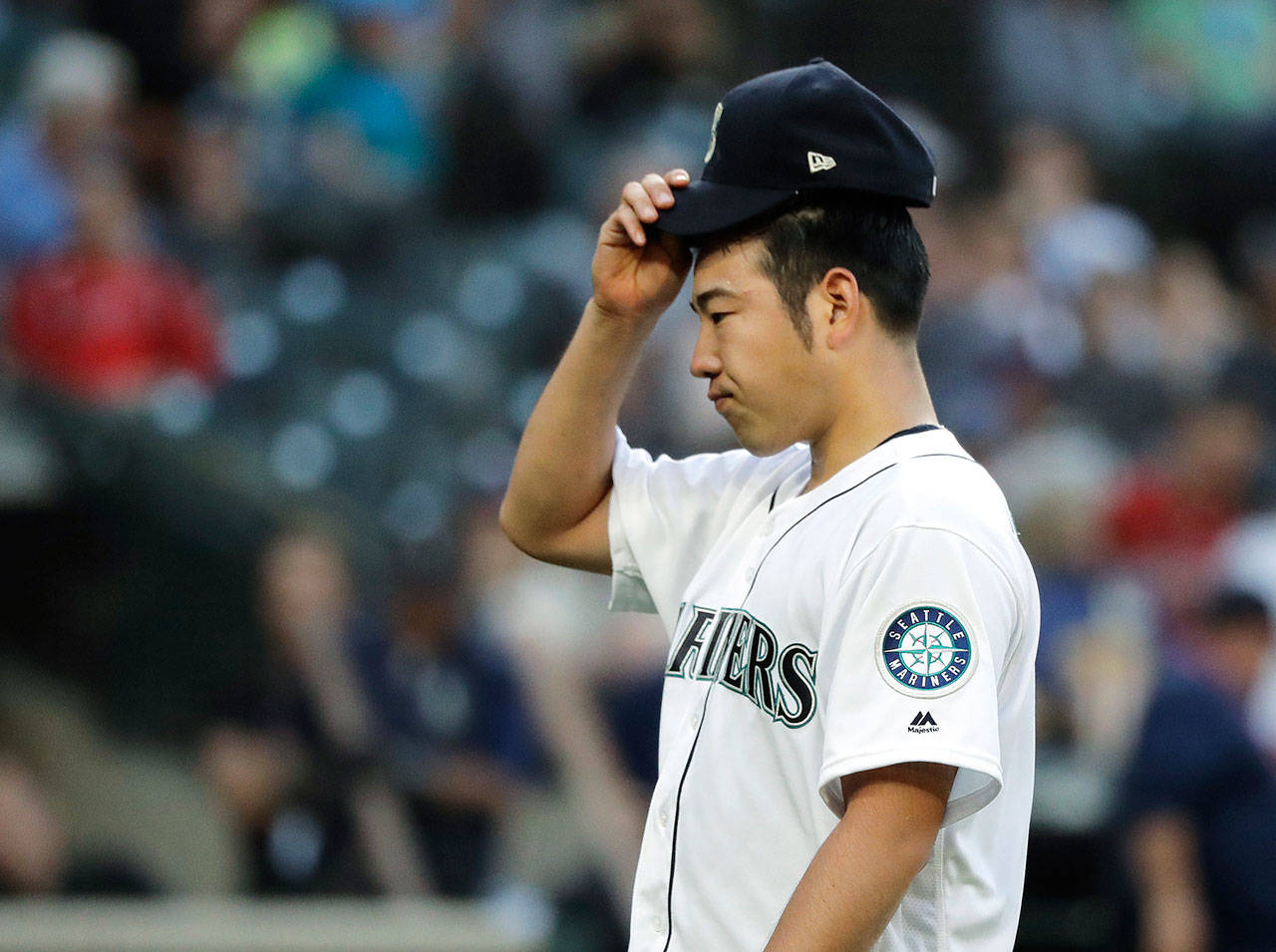 Mariners starting pitcher Yusei Kikuchi walks off the field after the top of the third inning of a game against the Angels on May 30, 2019, in Seattle. (AP Photo/Ted S. Warren)