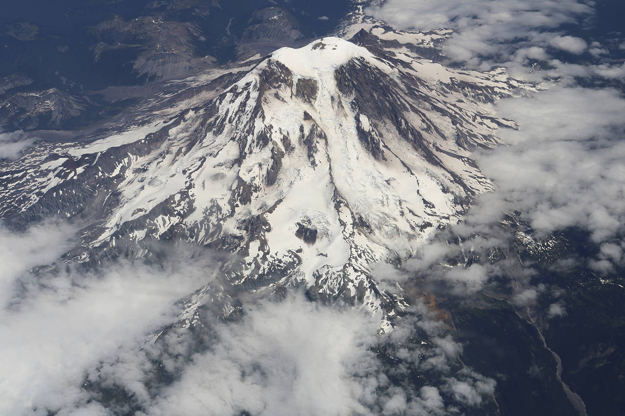In this July 2018 photo, Mt. Rainier is seen in an aerial image. (AP Photo/Ritu Shukla, file)