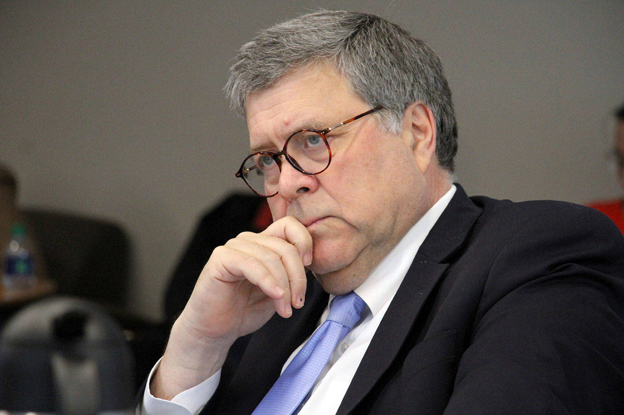 U.S. Attorney General William Barr listens to concerns raised about public safety in rural Alaska during at a roundtable discussion at the Alaska Native Tribal Health Consortium on Wednesday. (AP Photo/Mark Thiessen)