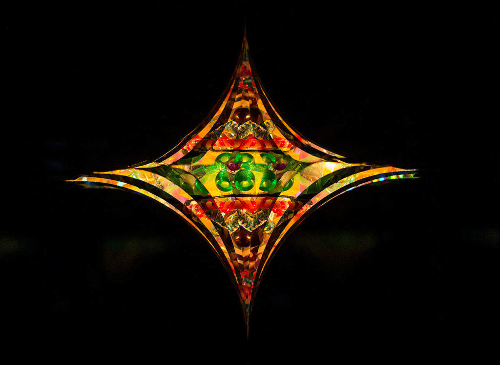 Bob Ade’s favorite kaleidoscope: “Crystal Star,” a table-top parlor scope model with a three-dimensional image that appears like a star that has a north and south pole with an equator and curved longitudinal segments from the poles to the equator. It was inspired in 1996 from night sky views over Puget Sound. (Andy Bronson / The Herald)
