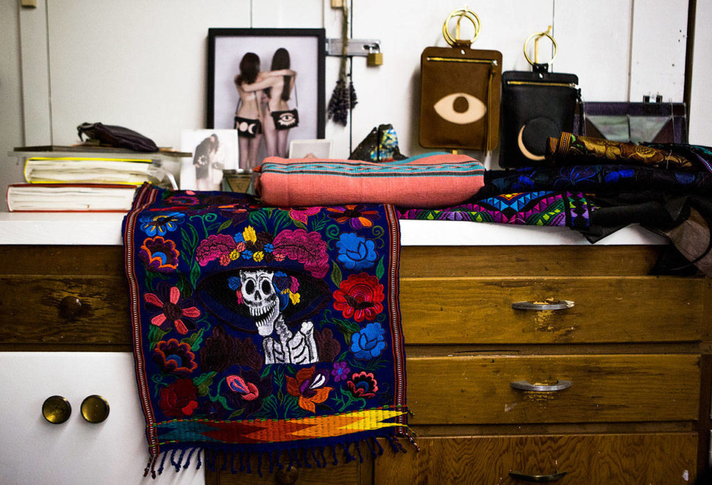Fabrics which Madeline Chadwick has collected during her travels, at her home in Lake Stevens. (Olivia Vanni / The Herald)
