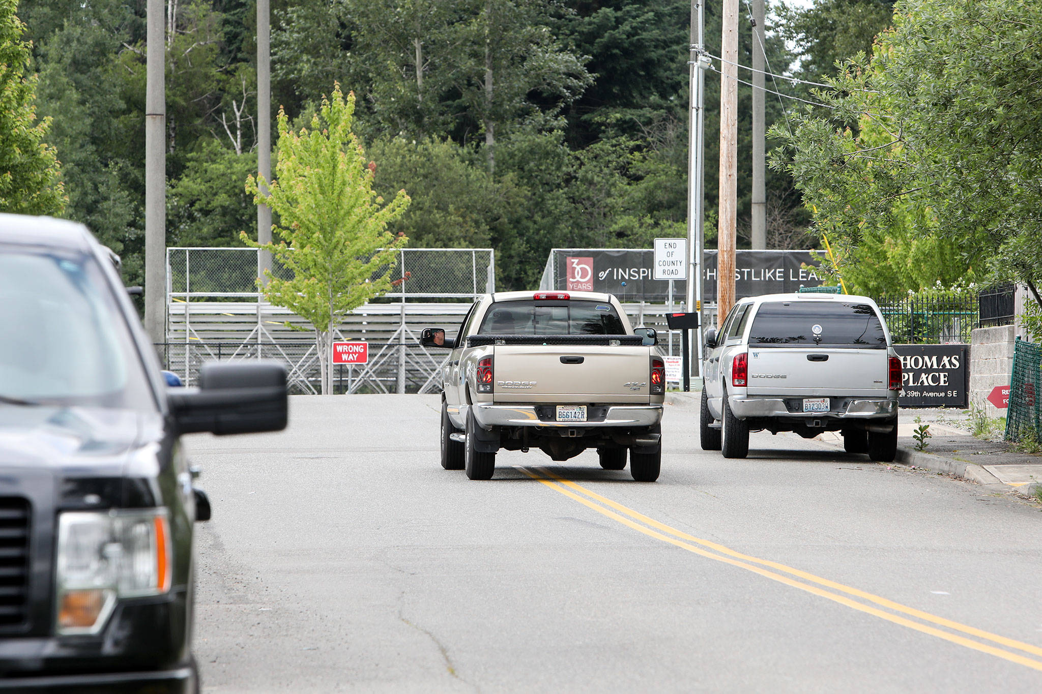 A truck parked on along 39th Avenue SE near Archbishop Murphy High School. Snohomish County prohibits parking along streets with double yellow lines if other vehicles have to cross over the center line too pass. (Lizz Giordano / The Herald)