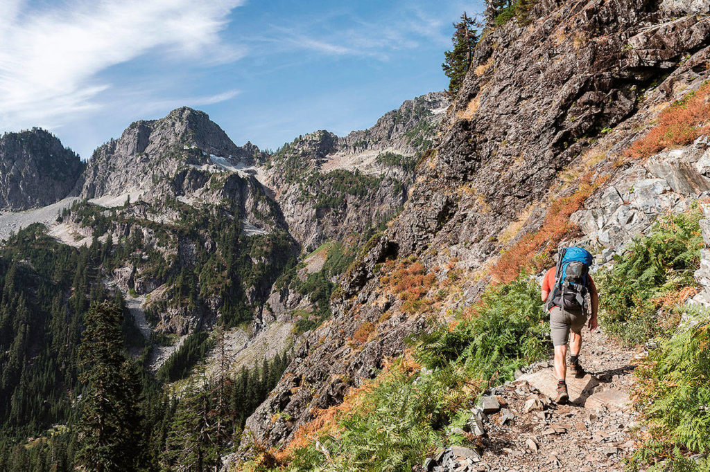 Nathan Barnes climbs toward Snow Lake in the Alpine Lakes Wilderness area. The Barnes brothers have hiked and reported on some 300 trails in Washington over the past 10 years, which they’ve posted on their website and blog, hikingwithmybrother.com. (Jeremy Barnes)

