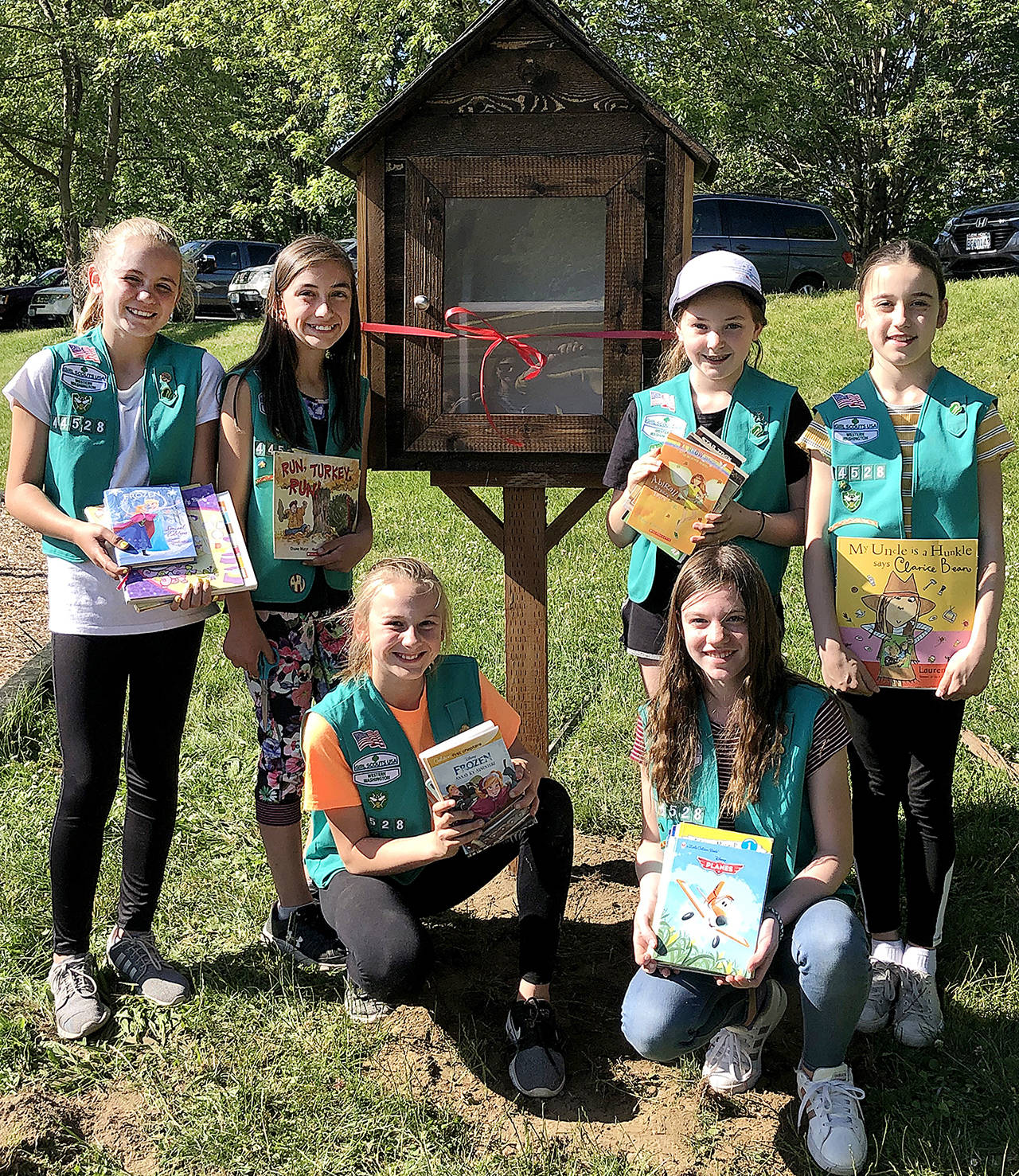 Wendy Poischbeg / City of Snohomish Girl Scout troop 44528 installed a free little library last week in Pilchuck Park in Snohomish.