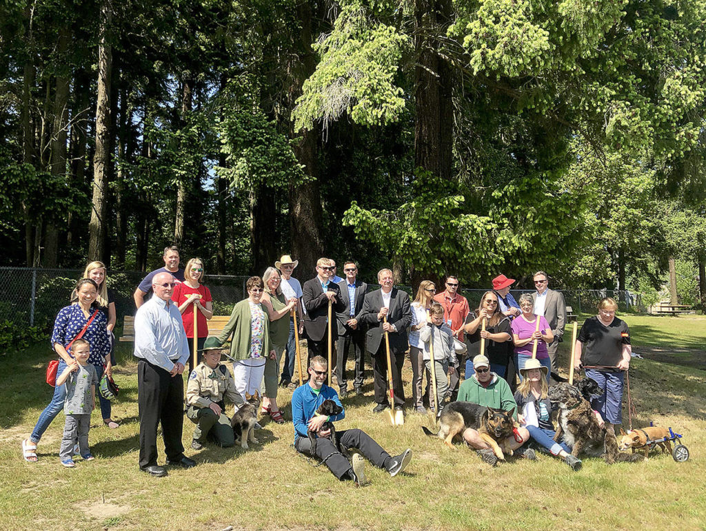 Parks staff and neighbors pose for a photo at the groundbreaking for Esperance Park in Edmonds on Thursday. (Julia-Grace Sanders / The Herald)
