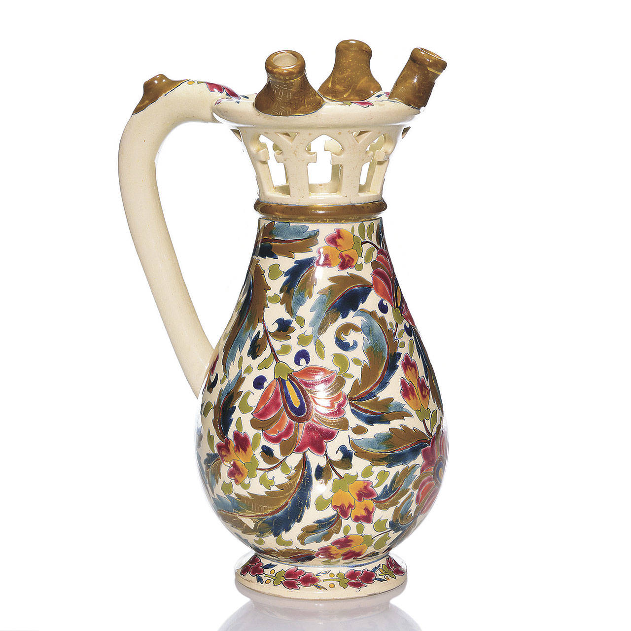 This traditional puzzle jug from Hungary is marked “Fischer J Budapest.” The mark on the puzzle jug was used from about 1867 to about 1895, even though the pieces look much older. (Cowles Syndicate Inc.)