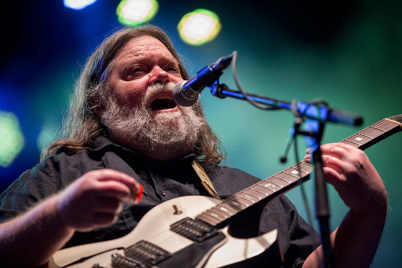 Roky Erickson performs at the South by Southwest Music Festival in Austin, Texas, on Marcy 17, 2018. Erickson, the blue-eyed, dark-haired Texan who headed the Austin-based 13th Floor Elevators, a pioneering psychedelic rock band in the 1960s that scored with “You’re Gonna Miss Me,” died, Friday. He was 71. (Jay Janner/Austin American-Statesman via AP)