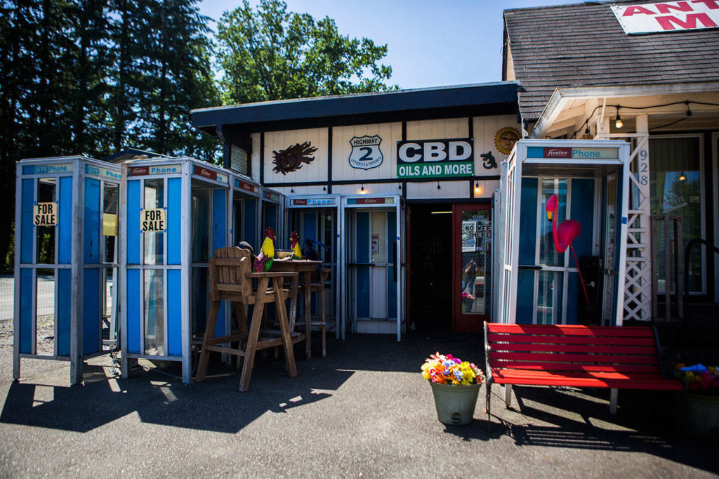 Highway 2 Collectibles & Imports has a large selection of pay phone booths, biker skull rings, CBD oils, kitsch and antiques.(Olivia Vanni / The Herald) 
