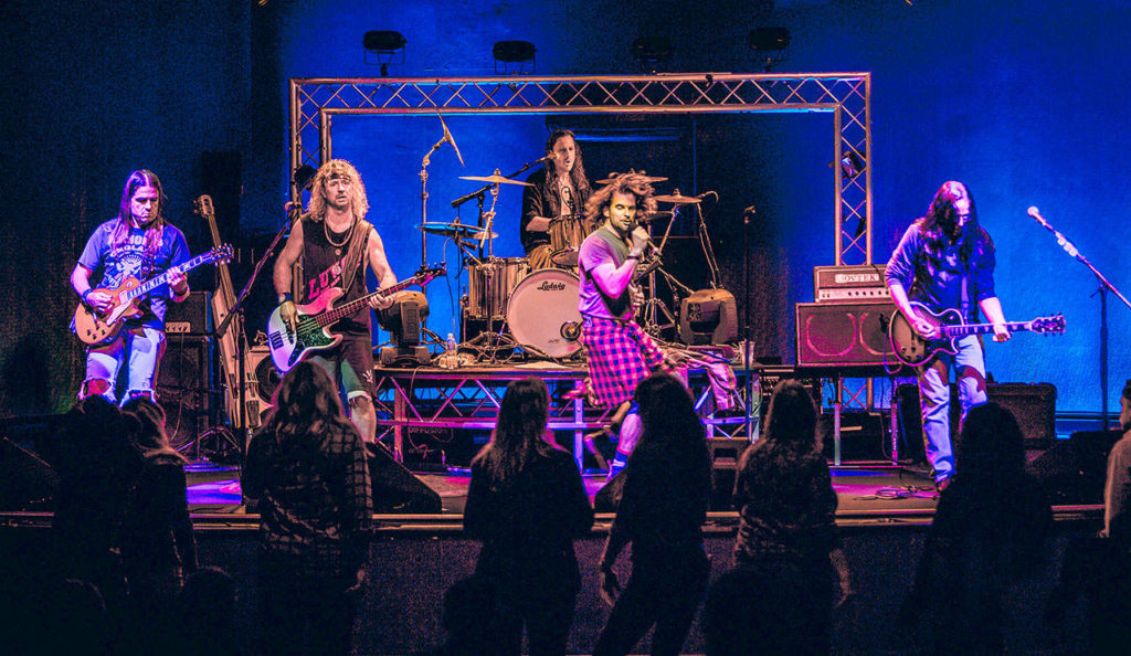 Washed In Black is, from left, Dave Farrell (lead guitar), Dan Nunn (bass), Kevin Hammond (drums), Steve McKeever (vocals) and John Trytek (rhythm guitar). (Joe Orsillo)
