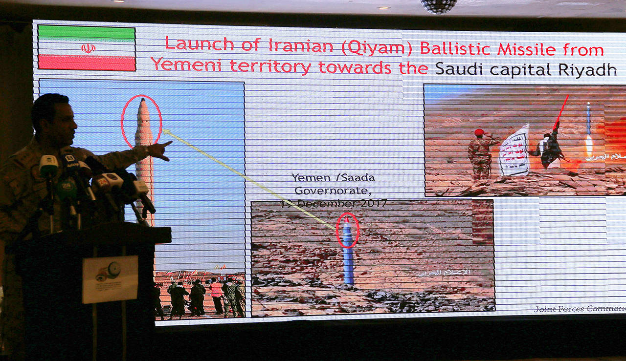 Col. Turki al-Malki, spokesman for the Saudi-led coalition fighting Huthi forces, points to a screen showing what he said was evidence of Iranian intervention and support to the Huthi in Yemen during a news conference in Mecca, Saudi Arabia on May 31. (AP Photo/Amr Nabil)