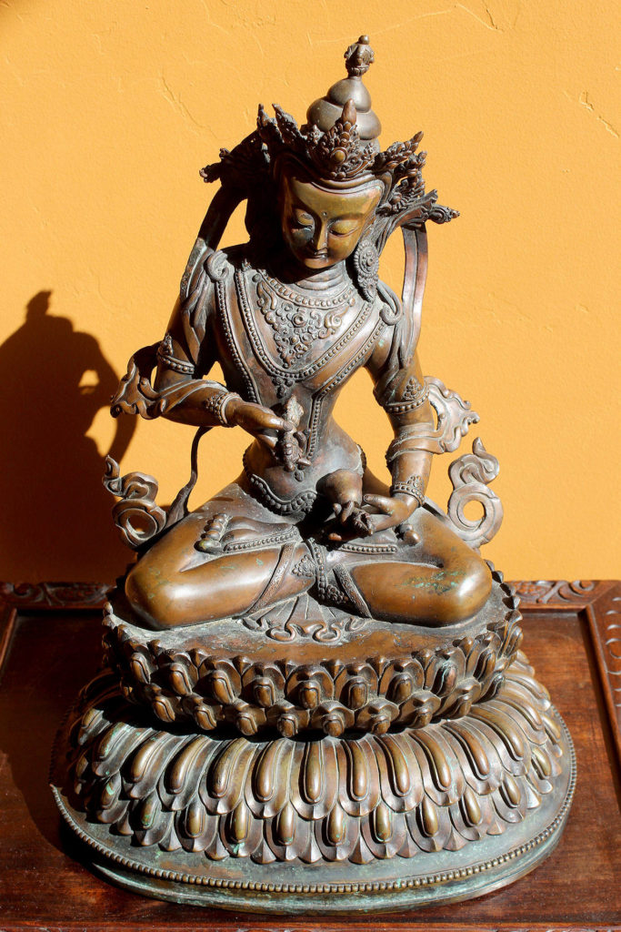 A statue of the deity Vajrasattva on display at the temple. (Patricia Guthrie / Whidbey News Group)

