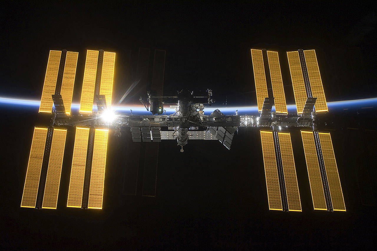 This 2009 photo shows the International Space Station seen from the Space Shuttle Discovery during separation. (NASA via AP)