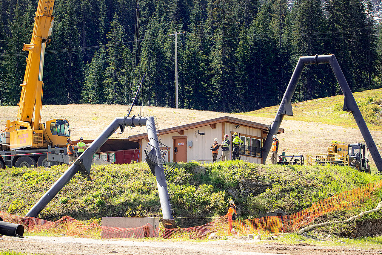 Crews laid down the first A-frame support structure after removing it from the previous loading terminal for the Daisy chair using a crane. (Vail Resorts)
