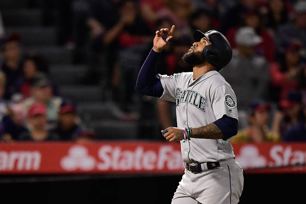 The Mariners’ Domingo Santana gestures after hitting a solo home run during the fifth inning of a game against the Angels on June 7, 2019, in Anaheim, Calif. (AP Photo/Mark J. Terrill)