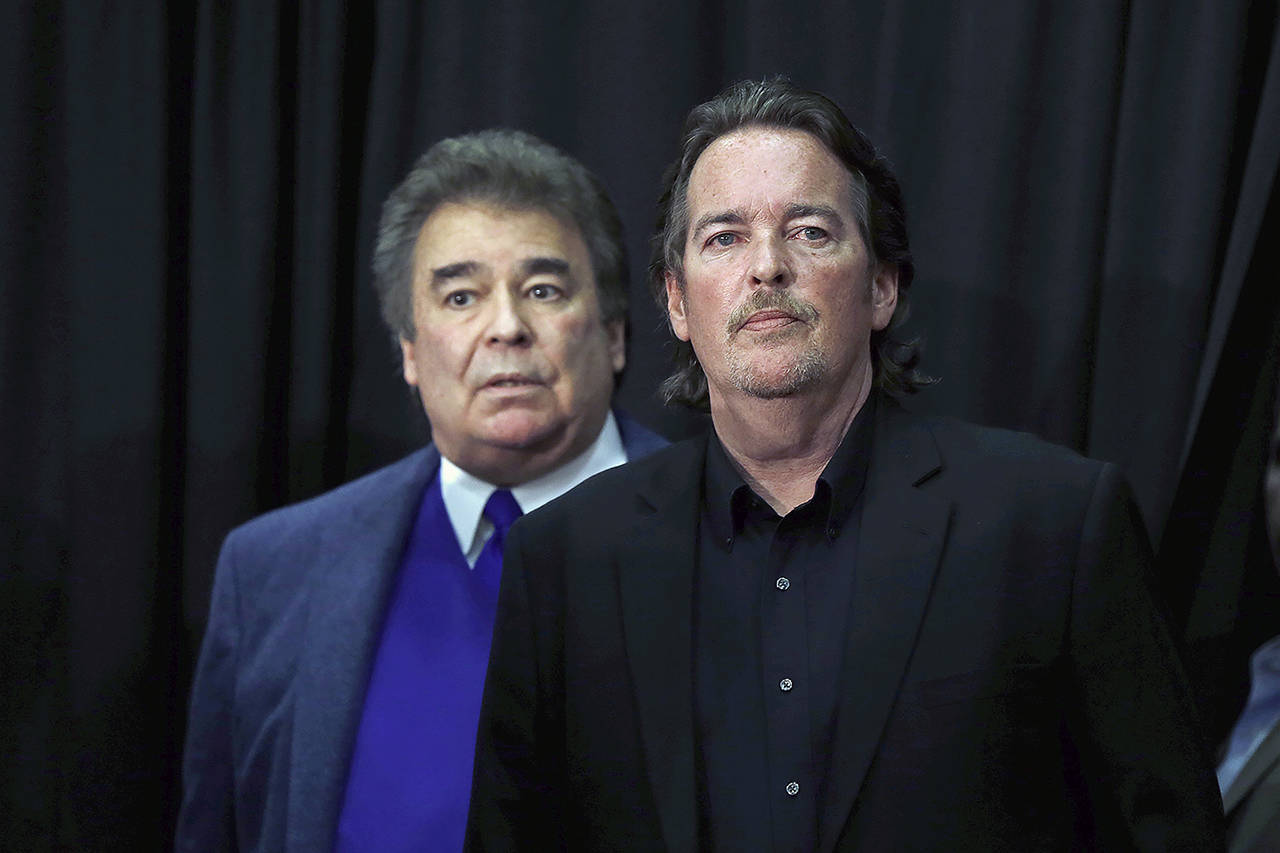 In this 2016 photo, Hillary Clinton’s brothers Tony Rodham (right) and Hugh Rodham attend a campaign stop for their sister in Dunmore, Pennsylvania. (AP Photo/Matt Rourke, File)
