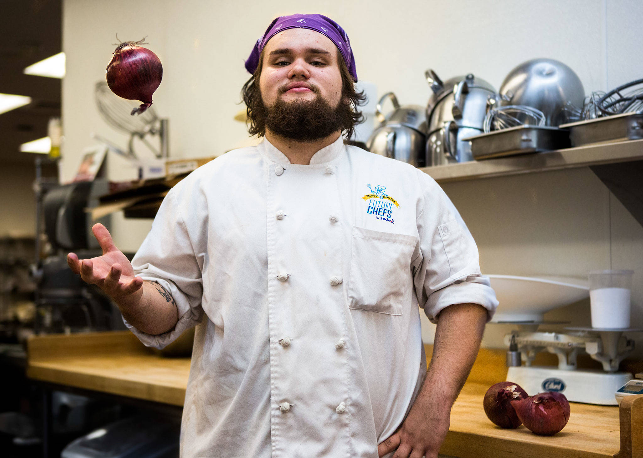 Andrew “Roo” Strom, seen here in the culinary classroom at Sno-Isle TECH Center in Everett, starts Monday at Carnation Farms as a chef’s assistant. He hopes to open his own gastropub someday. (Olivia Vanni / The Herald)
