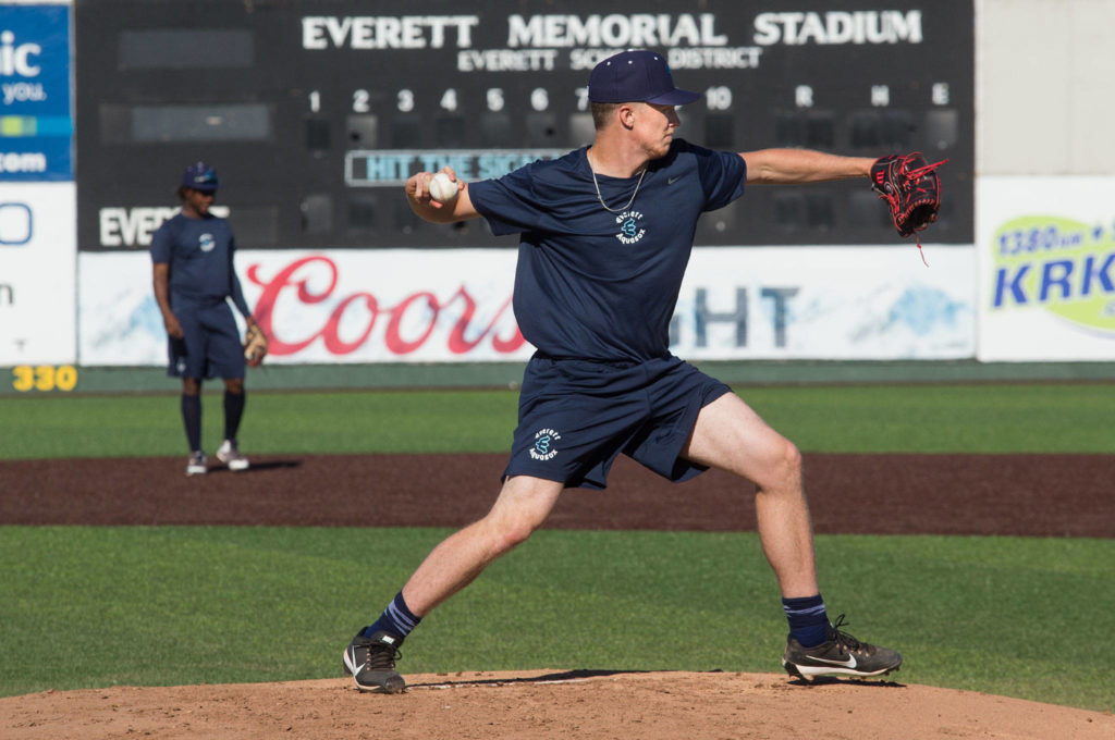 Everett AquaSox forth-round draft pick and pitcher Tim Elliott throws to first base on the first day of practice at Funko Field on Tuesday, June 11, 2019 in Everett, Wash. (Andy Bronson / The Herald)
