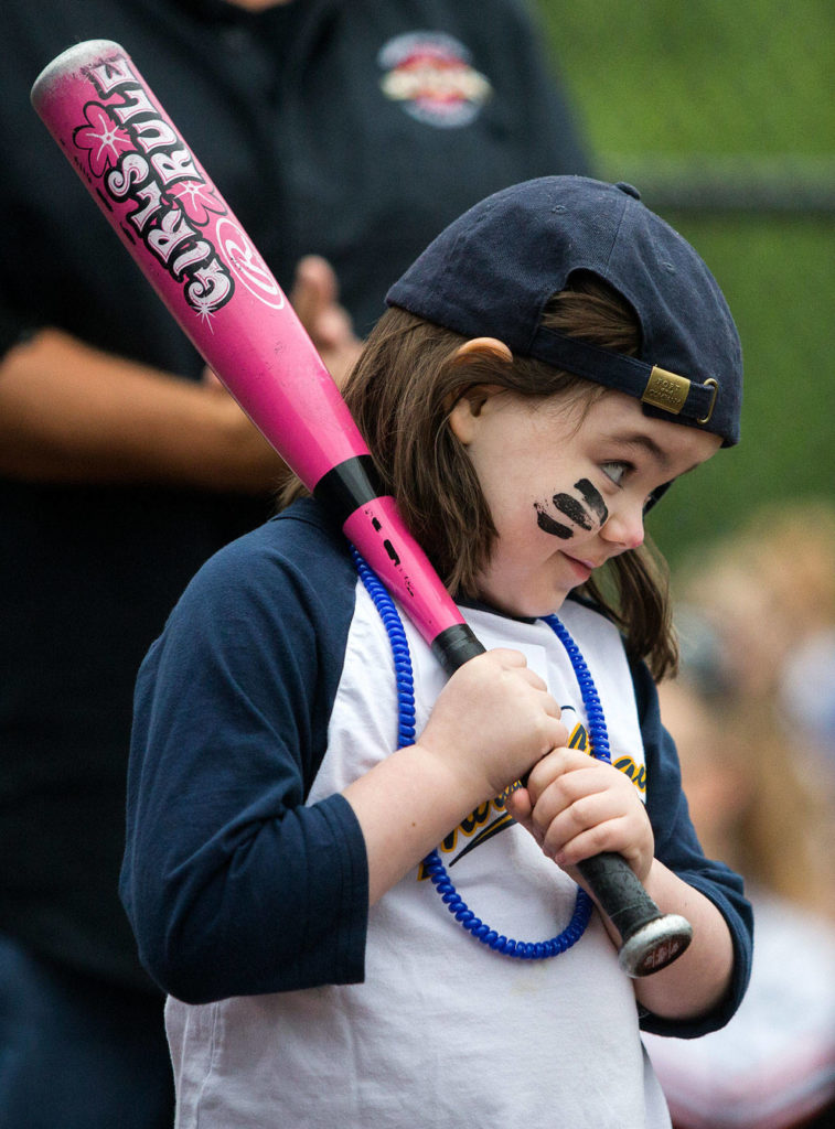 Makenna Broughton, 6, makes an expression while stepping up to the plate. (Olivia Vanni / The Herald)
