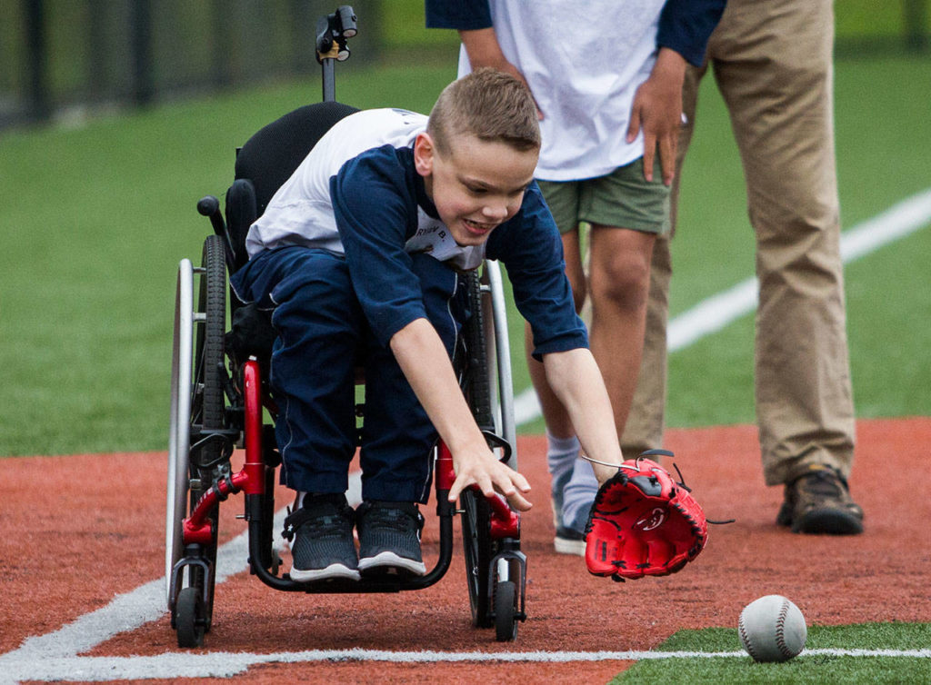 Ryan Lawrence Barton, 11, fields a ground ball. (Olivia Vanni / The Herald)
