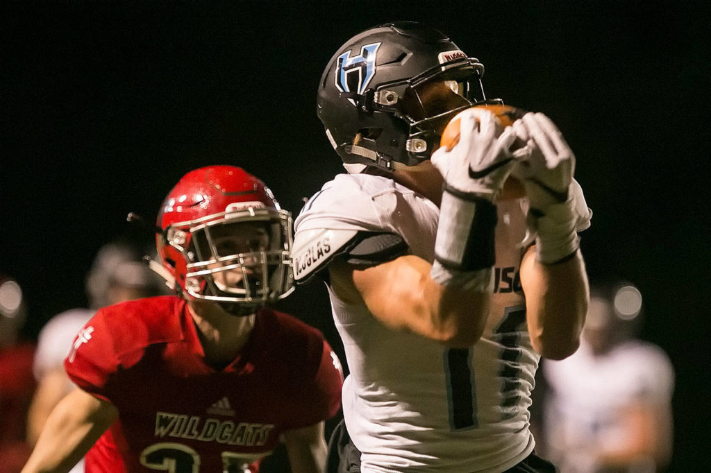 Hockinson’s Sawyer Racanelli (right) makes a touchdown reception with Archbishop Murphy’s Walter Hines trailing at Archbishop Murphy High School in Everett on Sept. 6, 2018. (Kevin Clark / The Herald)

