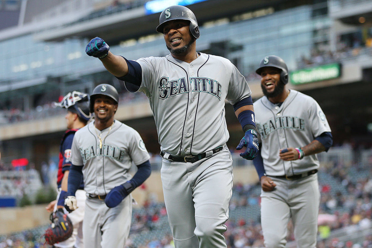 Edwin Encarnacion celebrates after hitting a home run during a game between the Mariners and Twins on June 11, 2019, in Minneapolis. (AP Photo/Stacy Bengs)