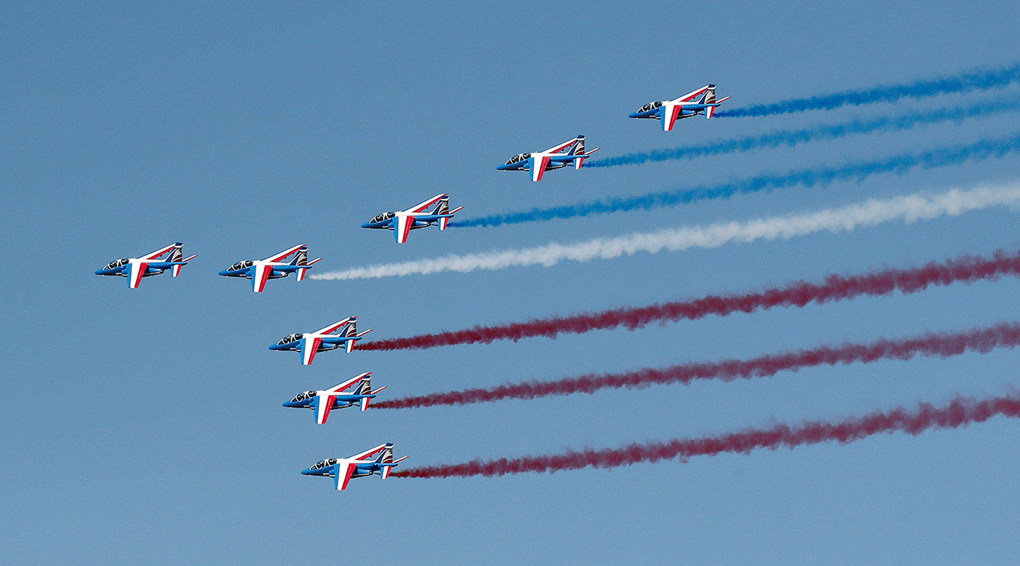 Alpha jets from the French Air Force Patrouille de France fly during the inauguration the 53rd International Paris Air Show at Le Bourget Airport near Paris, France, on Monday. (Benoit Tessier/Pool via AP)