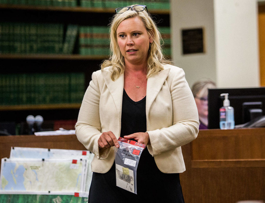 Defense attorney Rachel Forde shows an evidence bag with a palm impression during her cross examination of Washington State Patrol forensic scientist Angela Hilliard during the trial for William Talbott II at the Snohomish County Courthouse on Tuesday in Everett. (Olivia Vanni / The Herald)
