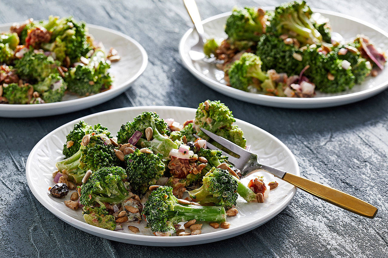A better broccoli salad starts with broccoli florets (which are blanched to make them optimally tender) and features toasted nuts, raisins, red onion and sun-dried tomatoes. (Photo by Tom McCorkle for The Washington Post)