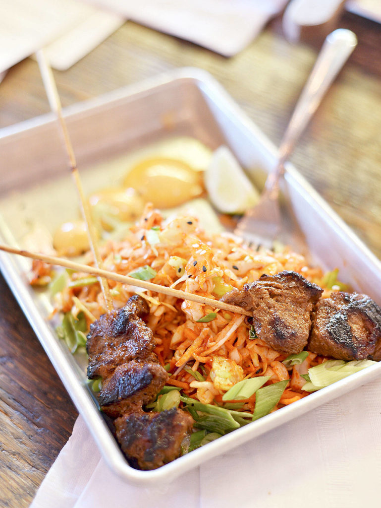 Korean beef skewers atop a spicy slaw were a delicious appetizer at Sound to Summit Brewing in Snohomish. (Miles McKee / For the Herald)
