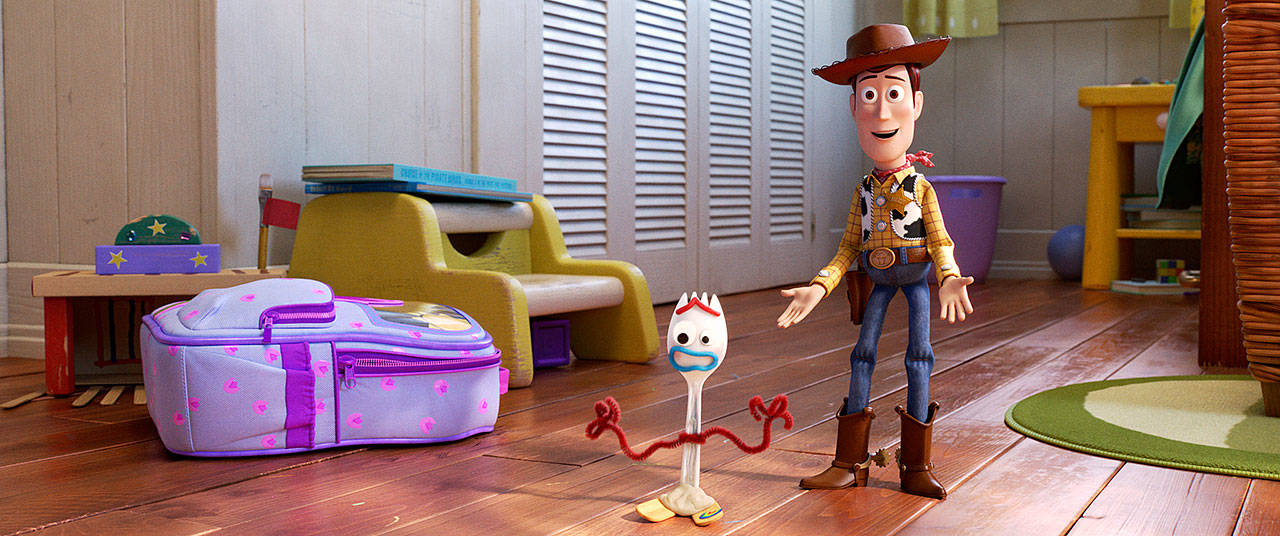 Woody (voiced by Tom Hanks) shows Forky (voiced by Tony Hale) the ropes in “Toy Story 4.” (Disney / Pixar)
