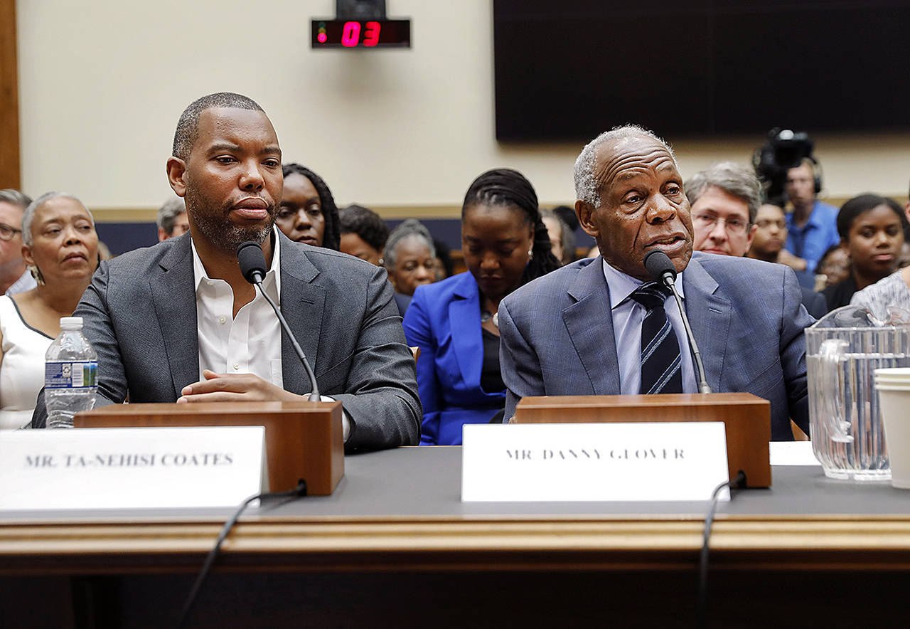 Actor Danny Glover (right) and author Ta-Nehisi Coates (left) testify about reparations for the descendants of slaves during a hearing before the House Judiciary Subcommittee on the Constitution, Civil Rights and Civil Liberties at the Capitol in Washington on Wednesday. (AP Photo/Pablo Martinez Monsivais)