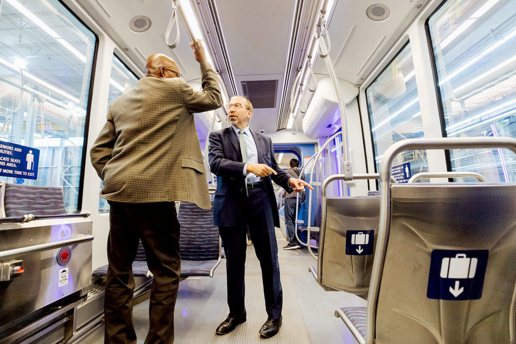 The first Siemens Link light rail vehicle was shown on Wednesday at the Sound Transit maintenance and operations center in Seattle. At right is Sound Transit CEO Peter Rogoff. (Sound Transit)
