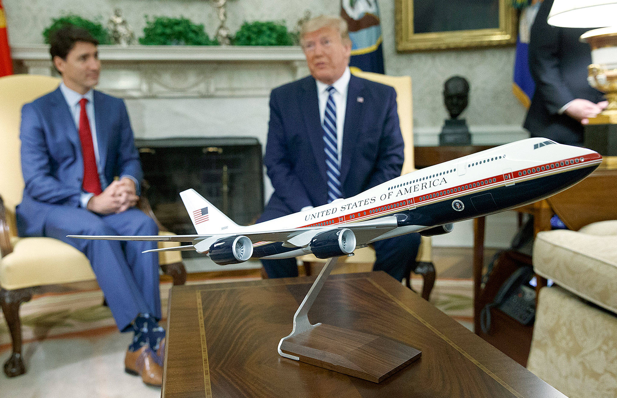 A model of the new Air Force One on a table during a meeting between President Donald Trump and Canadian Prime Minister Justin Trudeau (left) in the Oval Office of the White House in Washington on Thursday. (AP Photo/Evan Vucci)